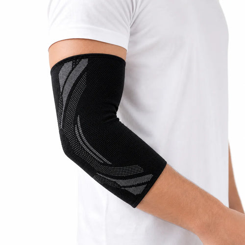 Armbågsstöd i elastiskt material med lätt kompression
